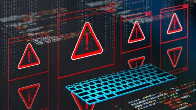 Digital warning windows with red exclamation triangles and a blue keyboard over binary code background.