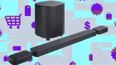 JBL soundbar with subwoofer and detachable wireless speakers against a blue background