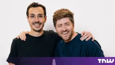 Ramp cofounders Karim Atiyeh and Eric Glyman smiling together against a white background.