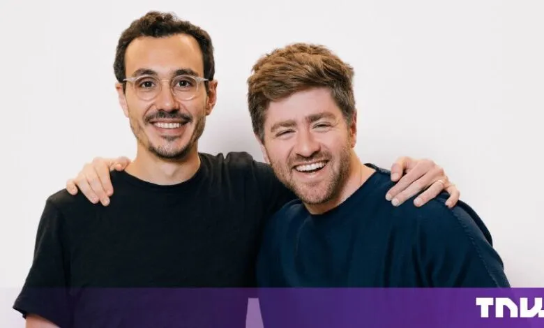Ramp cofounders Karim Atiyeh and Eric Glyman smiling together against a white background.