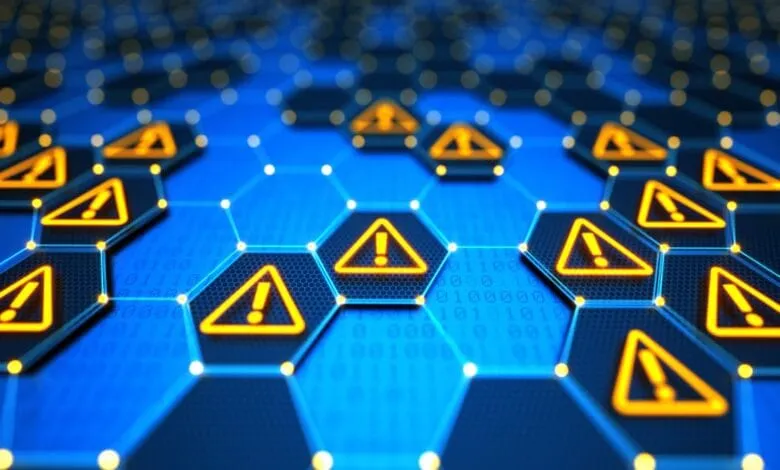 Abstract digital network with glowing hexagonal nodes displaying warning signs, indicating potential system errors or security breaches.