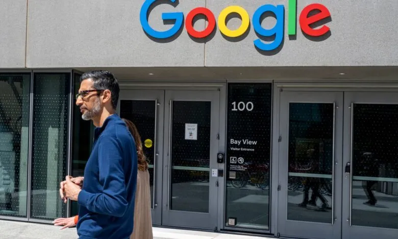 Sundar Pichai, Google CEO, walks past the Google Bay View campus entrance.