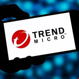Close-up of a smartphone displaying the Trend Micro logo, a red and white stylized 't' within a circle.