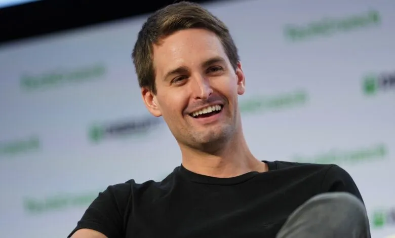 Evan Spiegel, CEO of Snap Inc., smiles during a conference.