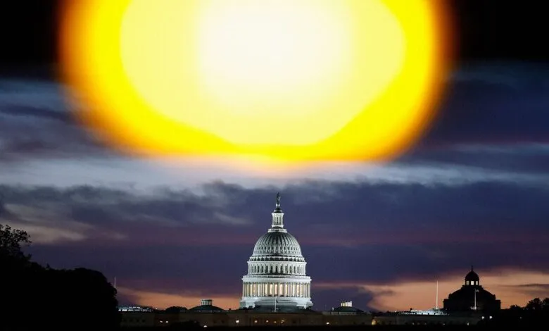 The U.S. Capitol building dome illuminated against a dramatic sunset sky.