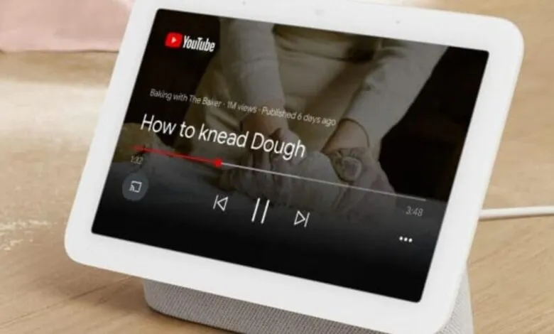 Smart display showing a YouTube video tutorial on how to knead dough.