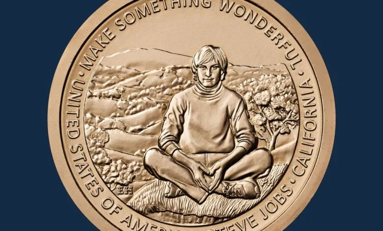 Commemorative coin featuring Steve Jobs meditating in a landscape.