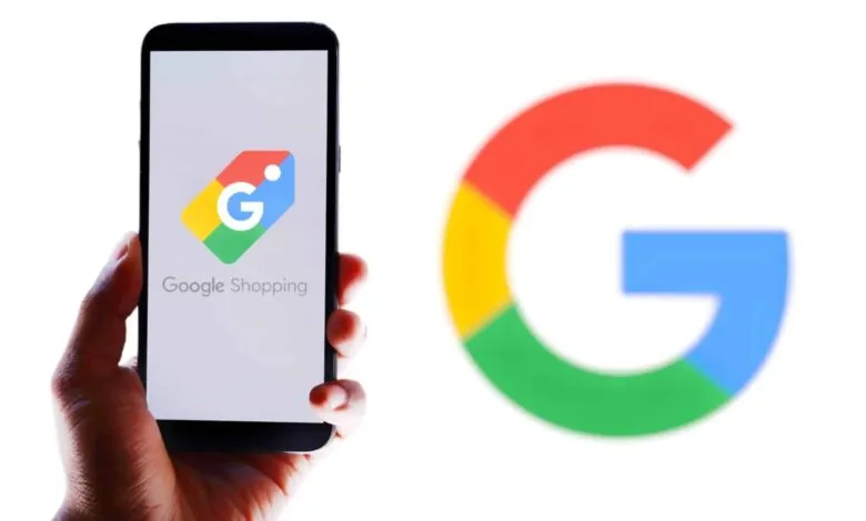 Hand holding a smartphone displaying the Google Shopping app logo and name.