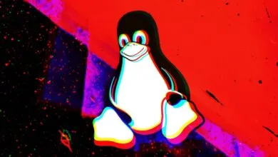Tux the Linux penguin mascot with a glitch effect against a vibrant red and dark background.