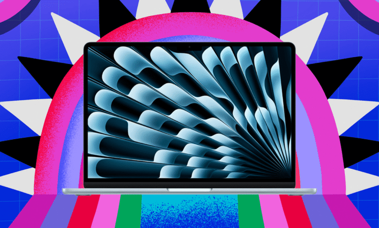 Open laptop with abstract blue screen against a colorful geometric background.
