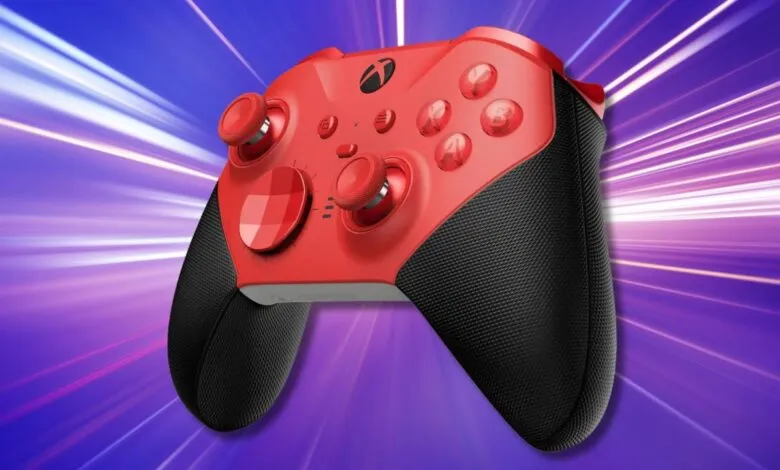 Red Xbox Elite Series 2 Core Controller with black grips on a dynamic background.