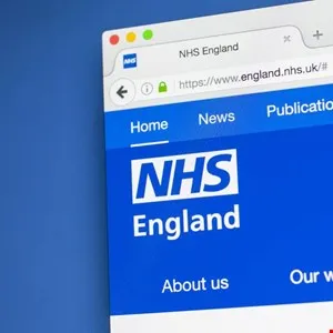 Screenshot of the NHS England website on a computer screen.