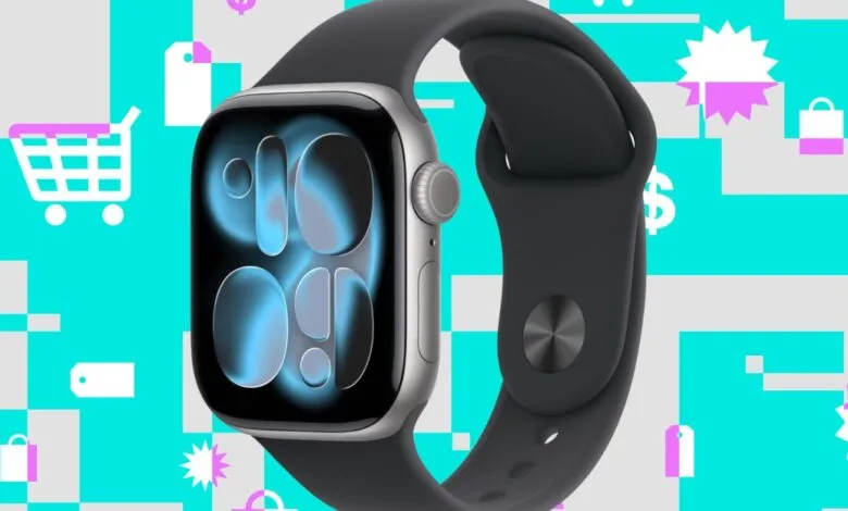 Close-up of a gray Apple Watch with a black band against a colorful shopping-themed background.