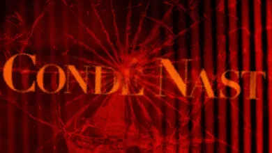 Condé Nast text over a cracked, red background with vertical stripes.