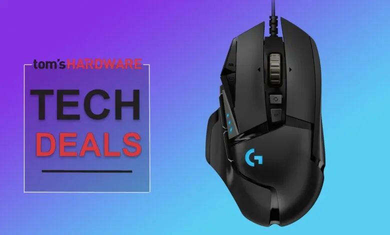 Black Logitech G502 gaming mouse on a gradient background.