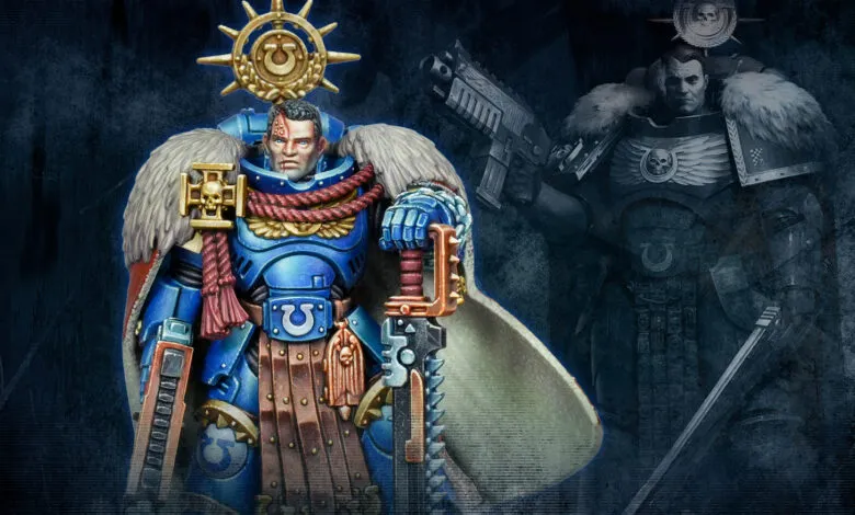 Warhammer 40k Ultramarines Captain miniature with power sword and bolter.