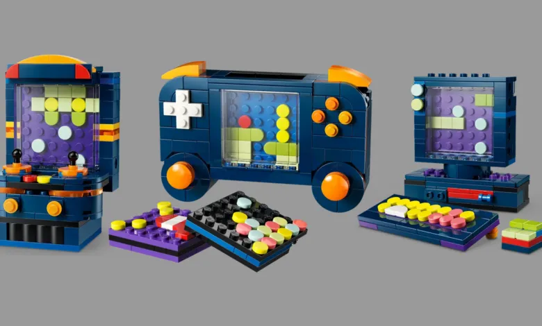 Three retro gaming consoles made of LEGO bricks, each a different design.