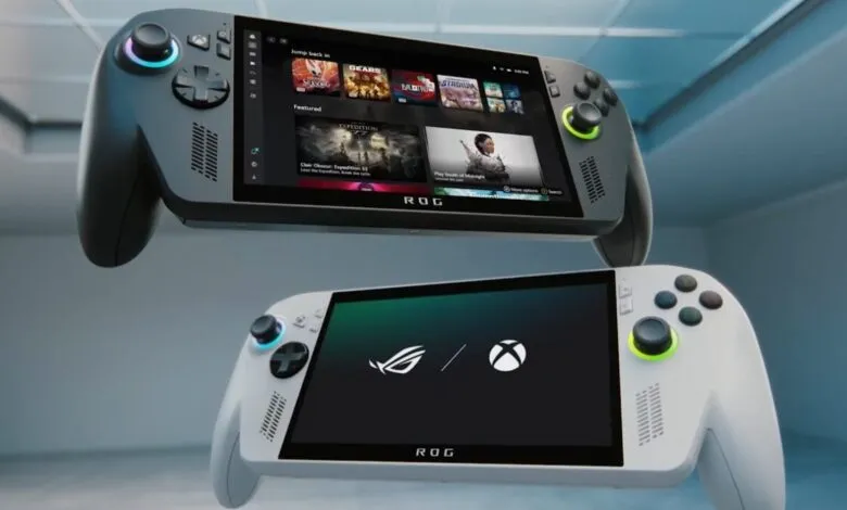 Two ASUS ROG Ally handheld gaming consoles, one gray and one white, stacked.