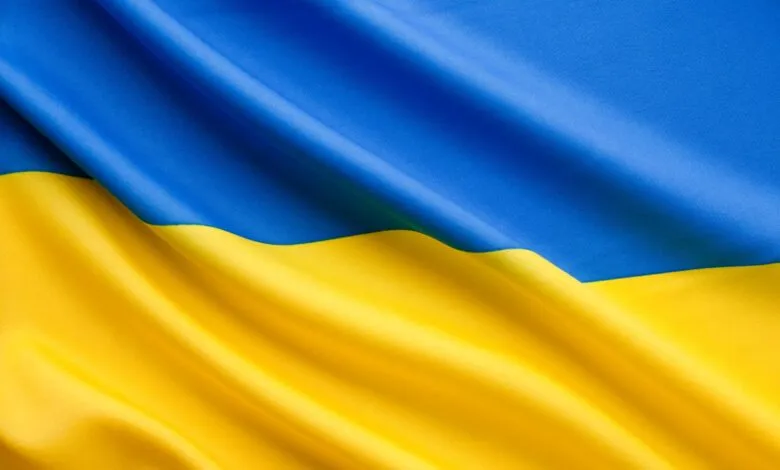 Close-up of the Ukrainian flag with blue and yellow colors.