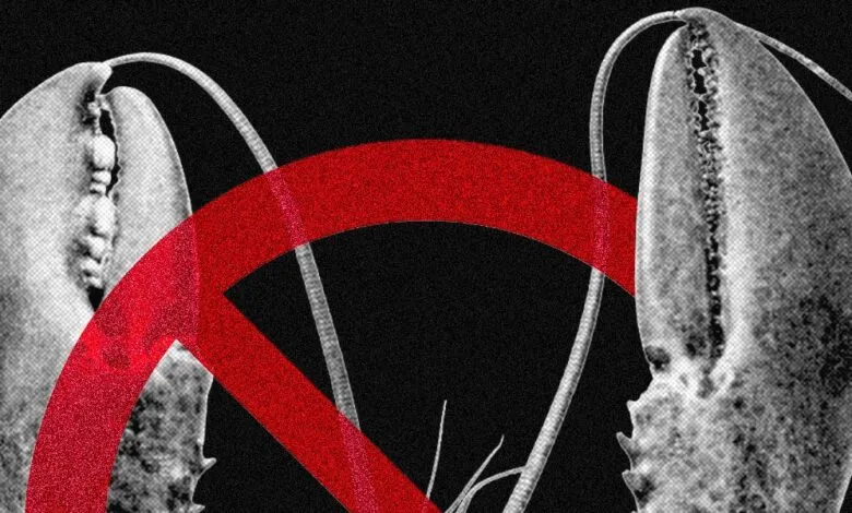 Lobster claws with a red 'no' symbol overlay, suggesting a ban.