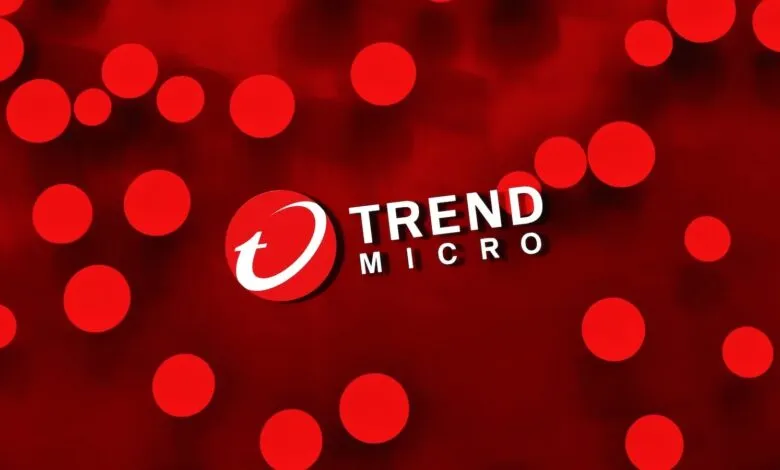 Trend Micro logo on red background with bokeh effect.