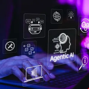 Hands typing on laptop with Agentic AI icons overlayed, representing artificial intelligence.