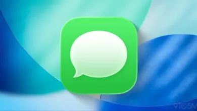 Apple Messages app icon on a blue and green textured background.