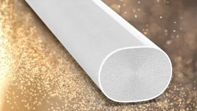 Close-up of a white Sonos soundbar against a bokeh background.