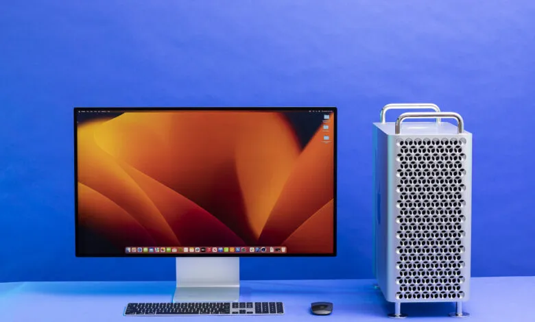 Apple Mac Pro and Pro Display XDR on a blue background.