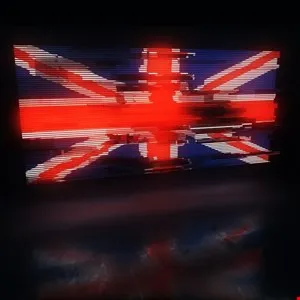 Distorted Union Jack flag with glitch effect, red, white, and blue.