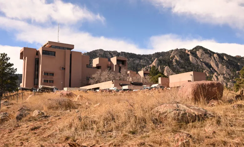 NCAR building in Boulder, Colorado with mountains in the background.
