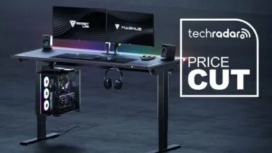 Secretlab Magnus Pro desk setup with dual monitors and gaming PC.