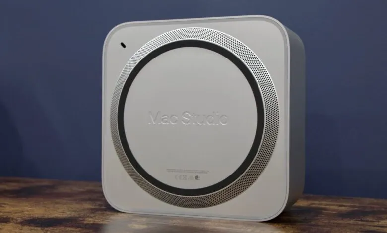 Apple Mac Studio desktop computer with circular vent design.