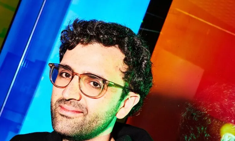Alon Lombard, CEO of Kalshi, poses with glasses.