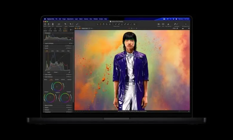 MacBook Pro displaying Capture One photo editing software with a model image.