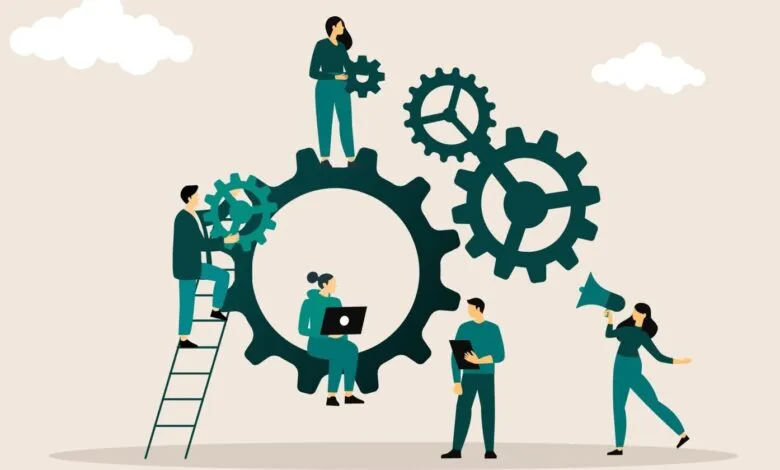 Teamwork illustration: people working together to turn gears.