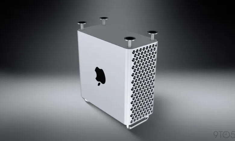 Silver Mac Pro computer tower with circular hole design.
