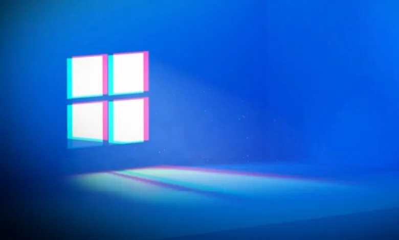 Windows logo with a glitch effect, cyan and magenta outlines.