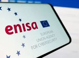 ENISA logo displayed on a smartphone screen, surrounded by blue stars.