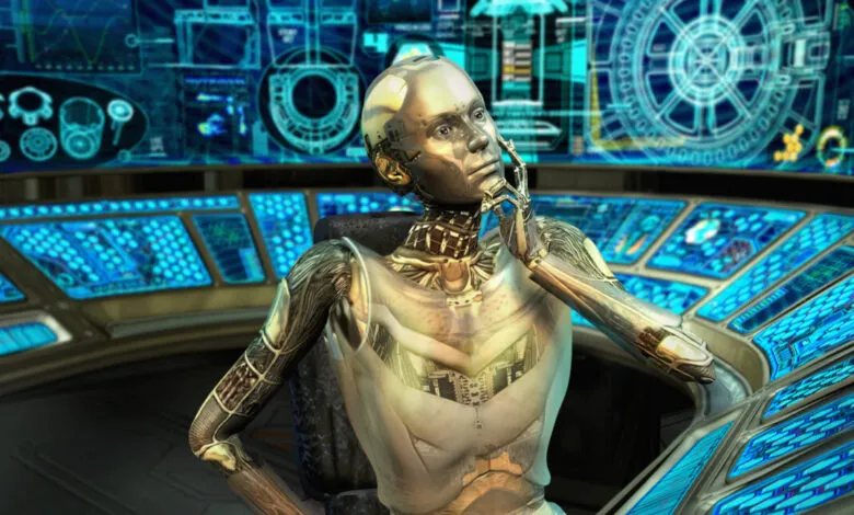 Robot with hand on chin sits at a futuristic control panel.