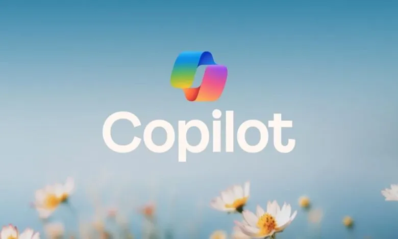 Microsoft Copilot logo with rainbow ribbon above the word 'Copilot'.