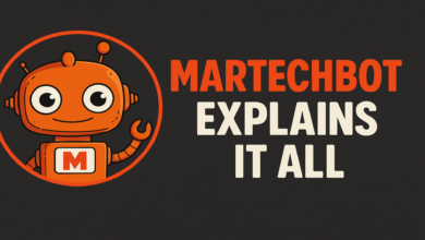 Orange cartoon robot with the letter M on its chest inside a circle.