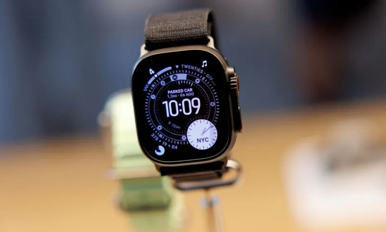 Close-up of an Apple Watch Ultra with a black band displaying 10:09.