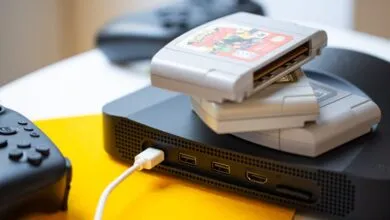 Analogue 3D console with N64 game cartridges and controller.