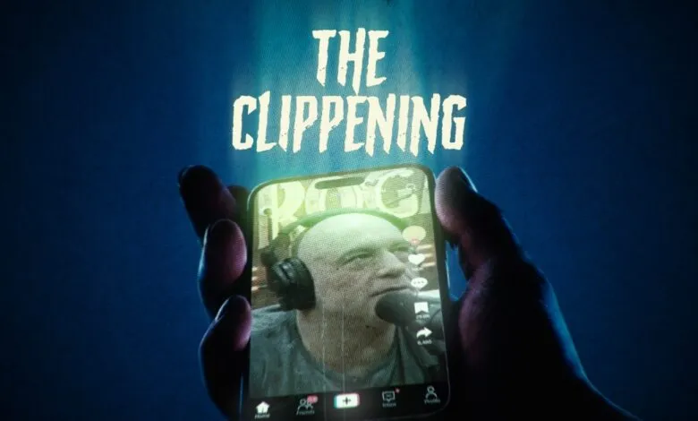 Hands hold phone displaying Joe Rogan podcast clip under 'The Clippening' title.