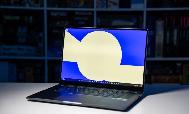Open Samsung laptop on a white surface with a blue and white screen.