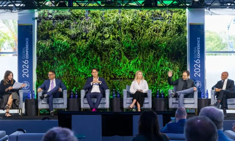 Panel discussion at the 2026 Global Conference with six speakers.