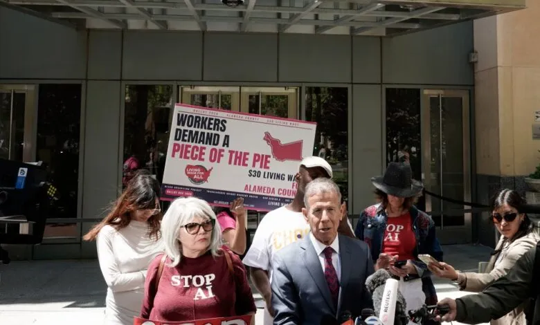 Group of people protesting for a $30 living wage in Alameda County.