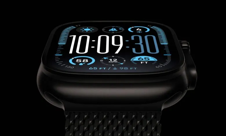 Close-up of a black Apple Watch Ultra 2 displaying time and various metrics.