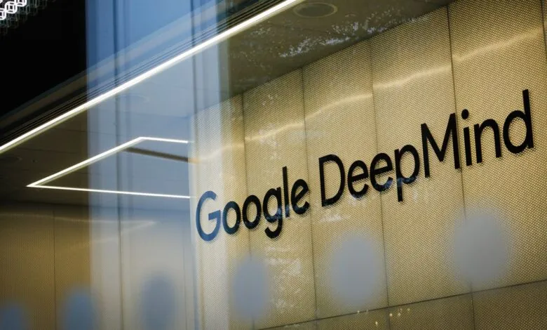 Google DeepMind logo on building facade, seen through glass.
